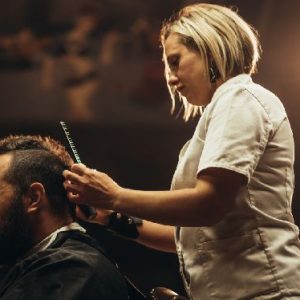 httpselements.envato.comyoung-bearded-man-with-a-mohawk-getting-haircut-by-QXCAAB6.jpg